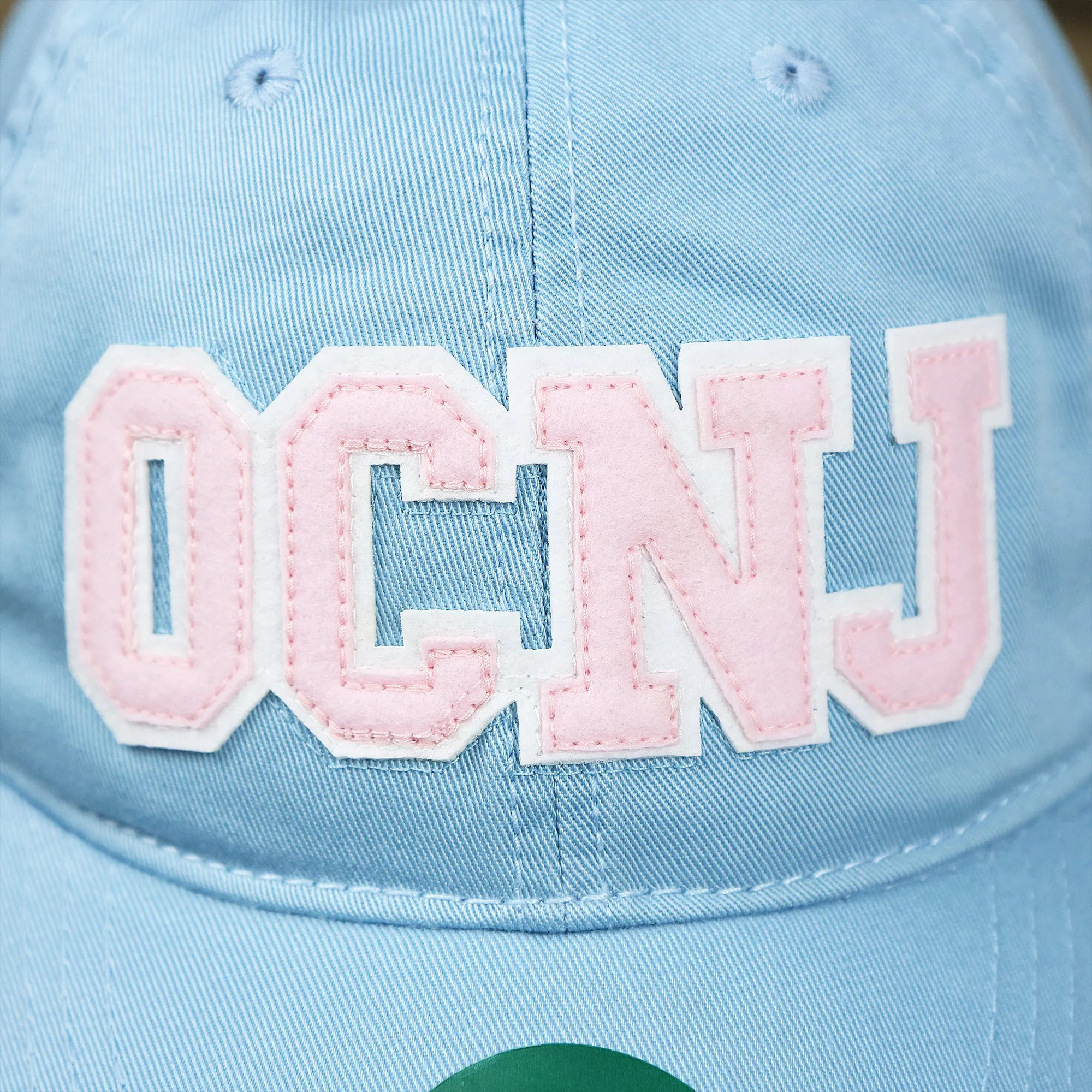 Youth Pink OCNJ Wordmark White Outline Dad Hat | Youth Light Blue Dad Hat