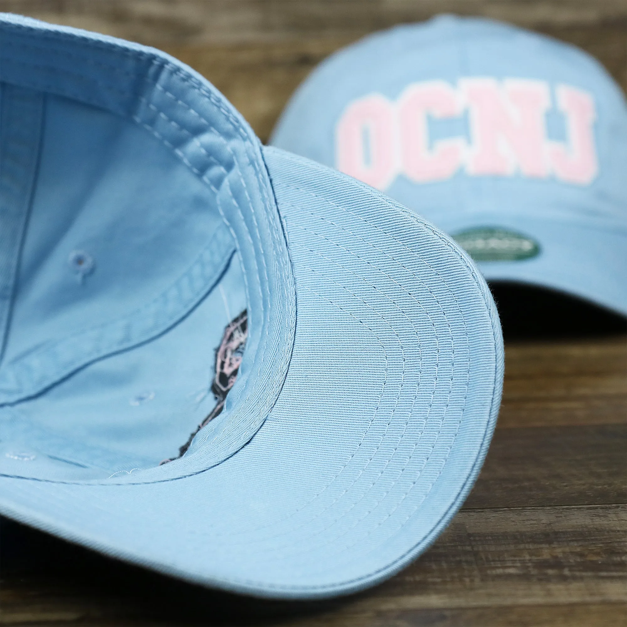 Youth Pink OCNJ Wordmark White Outline Dad Hat | Youth Light Blue Dad Hat